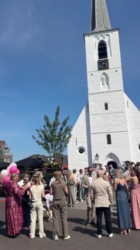 Wedding celebration at white church in Noordwijk Netherlands