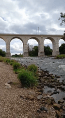 Bolesławiec's stone railway viaduct spans the Bóbr River
