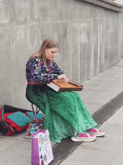 Woman spotted playing music, visiting ruins in Tyumen