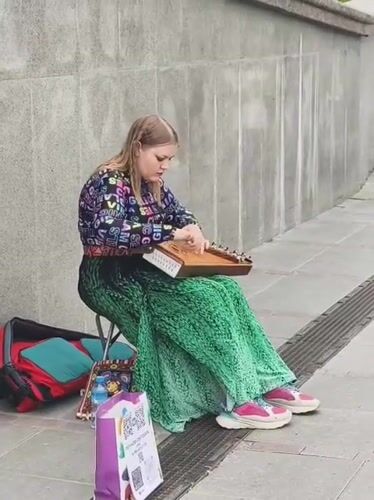 Woman spotted playing music, visiting ruins in Tyumen