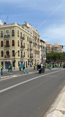 Green-shirted protesters march through València streets in daytime demonstration