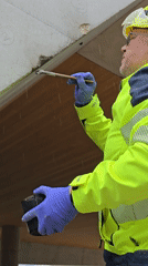 Construction workers repair concrete structures in Ramat HaSharon