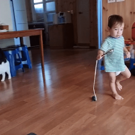 Toddler's summer morning with pets and an outdoor bath