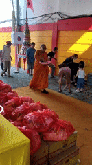 Buddhist monks perform indoor ritual ceremony in Magelang