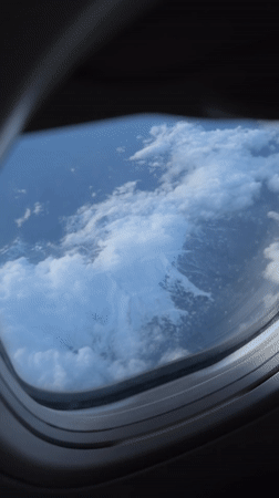 Passenger documents flight views and cabin scenes near Egypt