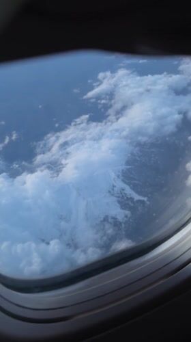 Passenger documents flight views and cabin scenes near Egypt