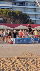 Beachside fitness class on a raised platform in Quarteira