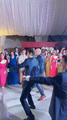 Wedding celebration with bouquet toss captured in Orizaba courtyard