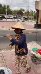Morning street vendor preparations captured in Vietnamese ward