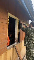 Family documents home renovation project with dog and children