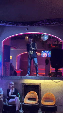 Gili Trawangan nightlife: live music, neon signs, and delman rides