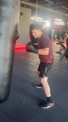 Solo boxing gym session: bags, bands, and sparring rounds
