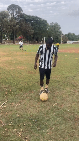 Soccer player practices ball juggling skills in Jos, Nigeria