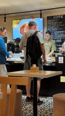 Customer makes payment at food establishment in Budva