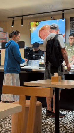 Customer makes payment at food establishment in Budva