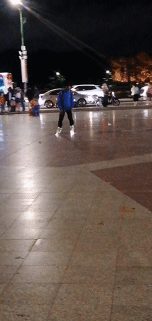 Nighttime skating and socializing at a Da Lat outdoor plaza
