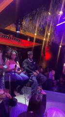 Stage performance or interview session captured in London