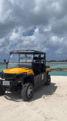 Tropical beach day documented with swimming, kayaking, UTV travel