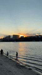 Family enjoys sunset beach time in Rostov-on-Don