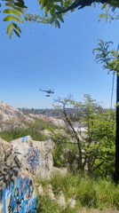 Helicopter carries suspended cargo over Plovdiv, Bulgaria