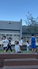 Children gather at outdoor steps in Ramat Gan