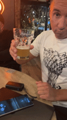 Evening drinks gathering at Bar Montenegro features beer toasts