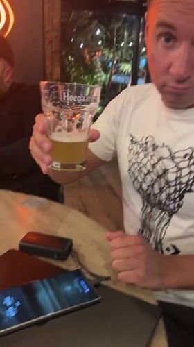 Evening drinks gathering at Bar Montenegro features beer toasts
