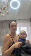 Woman documented during routine activities with child in Odintsovo