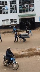 Bukuru market streets in full mid-morning swing