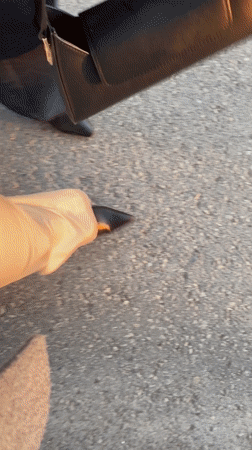 Pedestrians cross street intersection in Ufa, Russia