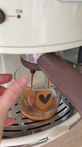 Espresso machine serves coffee over ice cubes in Montenegro