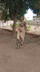 Woman in traditional dress photographed in Shaba, Nigeria