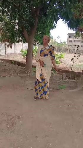 Woman in traditional dress photographed in Shaba, Nigeria