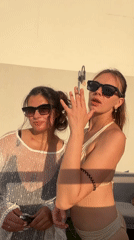Friends enjoy summer afternoon poolside in Ashdod