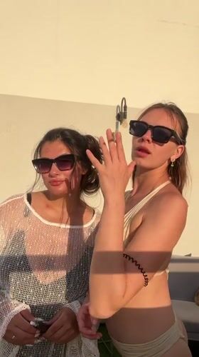 Friends enjoy summer afternoon poolside in Ashdod