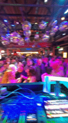 DJ set in full swing at a packed Moscow nightclub