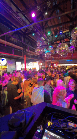 DJ set in full swing at a packed Moscow nightclub