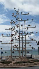Colorful pinwheel sculpture spotted in Spanish coastal roundabout