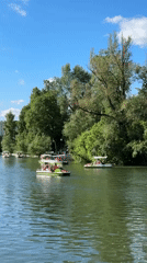 Paddle boats enjoy sunny day on Moscow waterway