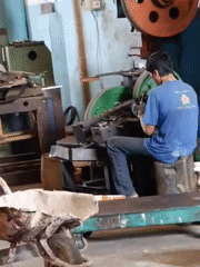 Inside a busy metal workshop in Belimbing, Indonesia