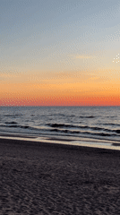 Sunset observed at Riga beach with colorful sky gradient