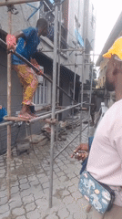 Scaffolding and solar installation work at a Lagos property