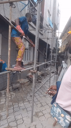 Scaffolding and solar installation work at a Lagos property