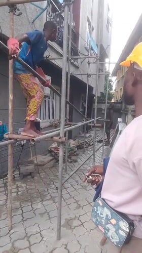 Scaffolding and solar installation work at a Lagos property