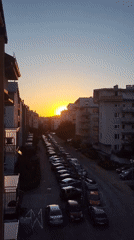 Urban sunset observed from multiple elevated vantage points