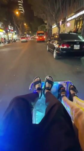 Nighttime cyclo ride captured in Nha Trang, Vietnam