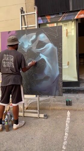 Street painting and a cow statue near La Rambla, Barcelona