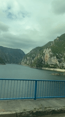 Driver captures scenic mountain views crossing bridge in Plužine, Montenegro