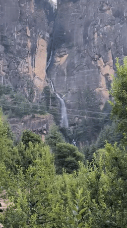 Morning yoga session documented at Bahang waterfall in India