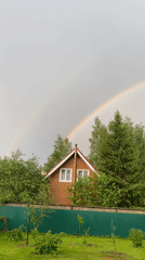 Rainbow appears over residential area in Patriot, Russia
